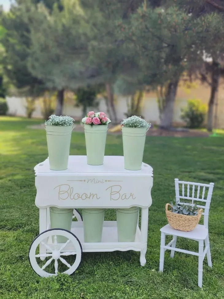 Mini Bloom Bar flower cart with sage buckets and fresh roses